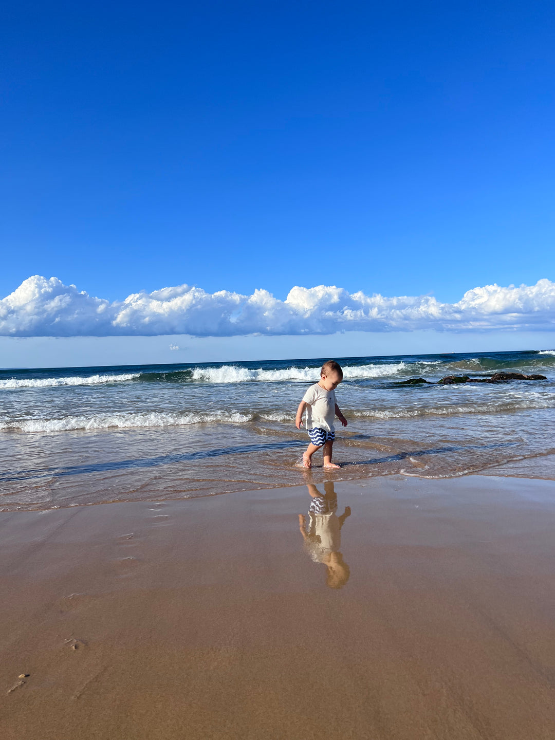 natural organic cotton baby t-shirt worn at the beach